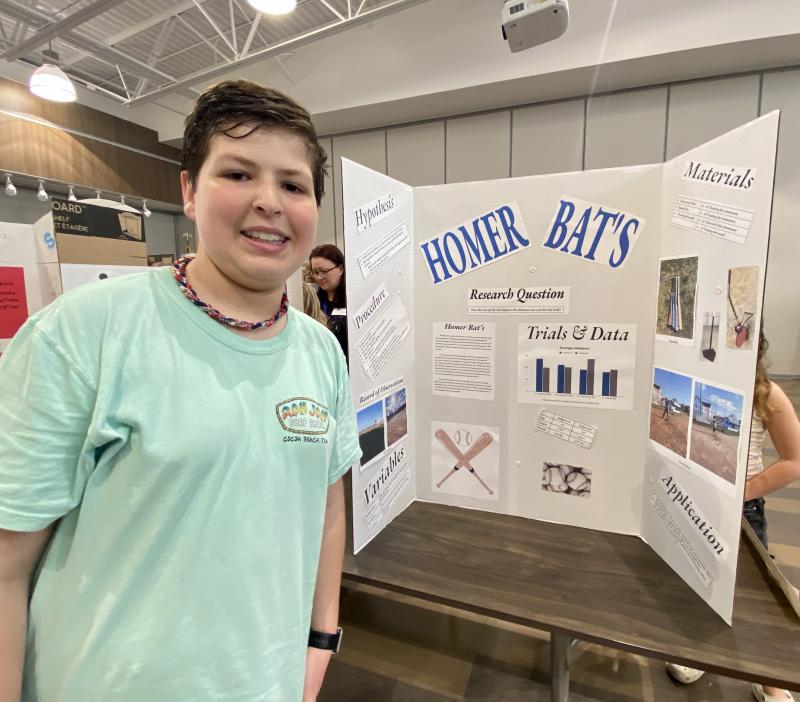 To find out what size bat to use to hit the most home runs, Love Creek student Leonardo Volpicella used three different length bats to learn that size does impact distance.